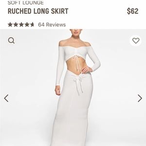 Large SKIMS “marble” long lounge skirt.